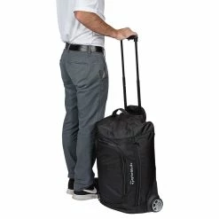 TaylorMade Performance Golf Rolling Carry On Bag 5 TaylorMade Performance Golf Rolling Carry On Bag -Golf Equipment Sales Store taylormade 2020 performance rolling carry on bag person holding